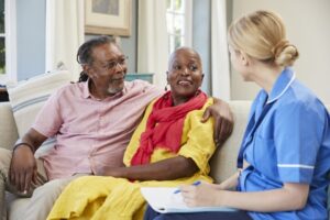 Home Care Nurse Visits Elderly Couple